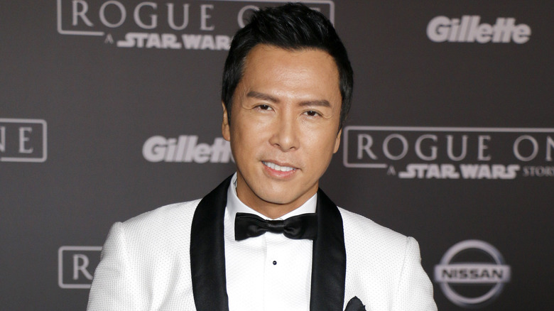 Donnie Yen in white suit