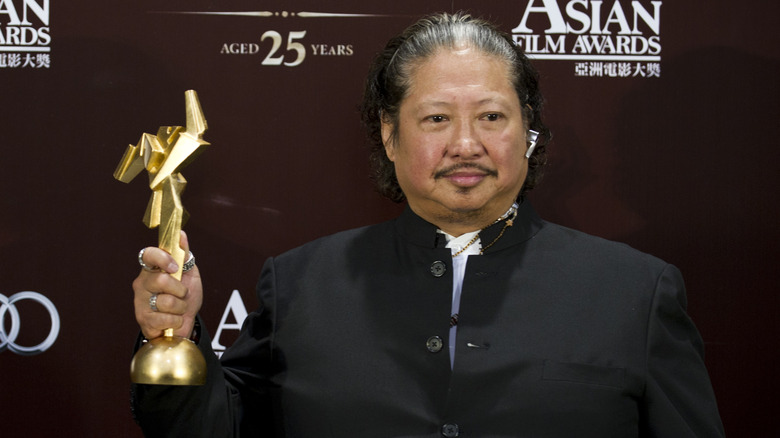 Sammo Hung holding Asian Film Award