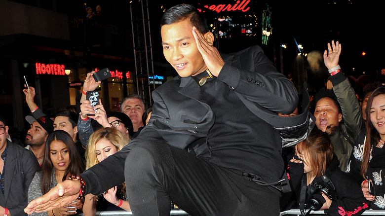 Tony Jaa jumping on red carpet