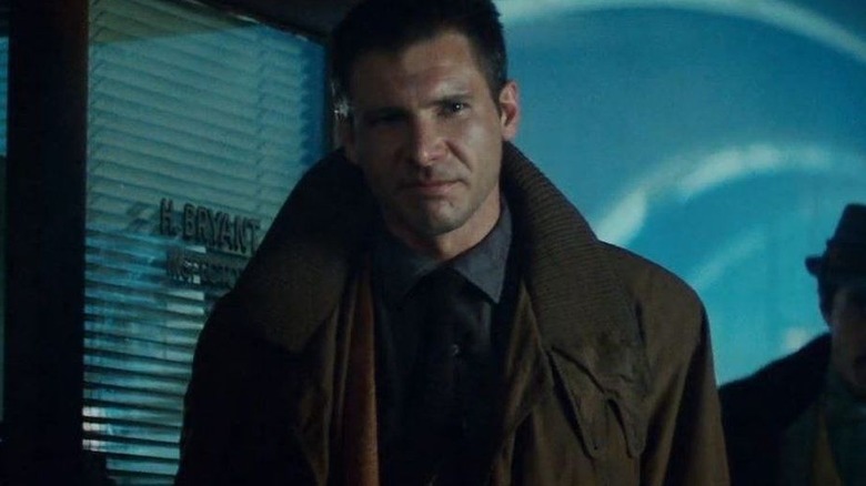 Deckard walks through the door