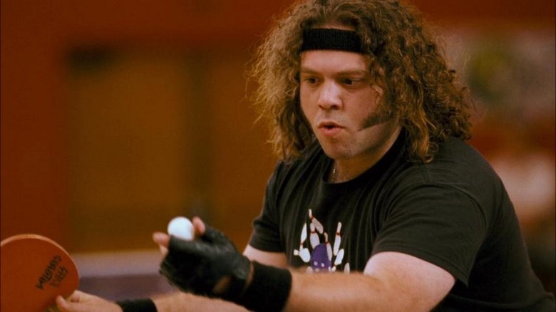 Dan Fogler prepares to serve