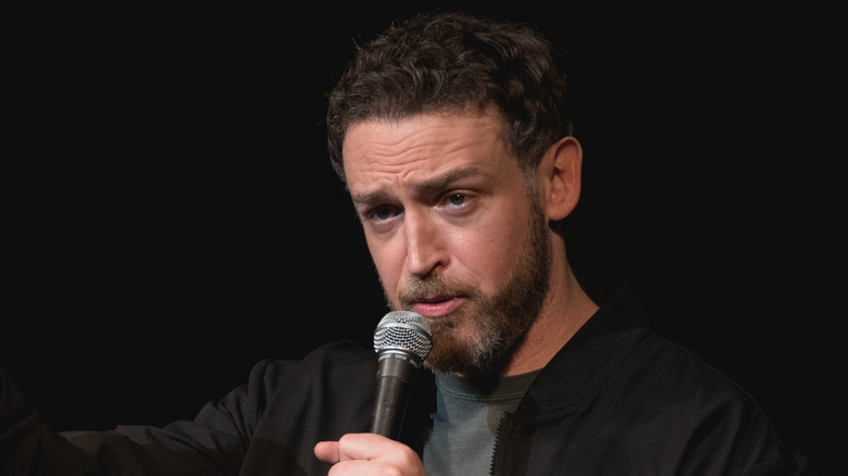 Dan Soder grimaces onstage