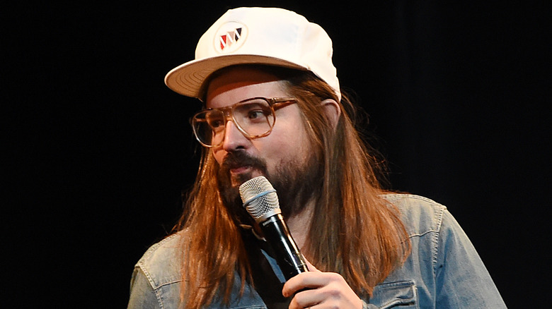 Dusty Slay onstage in hat