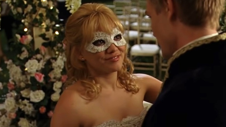 Sam smiling in masquerade mask