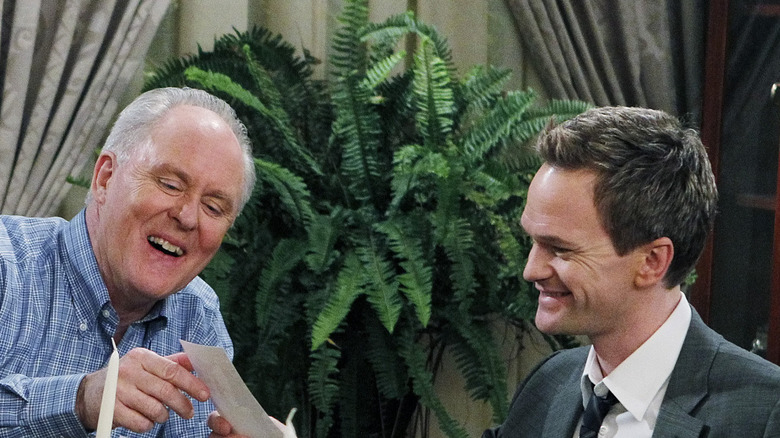 Barney Stinson and Jerry Whittaker laughing.