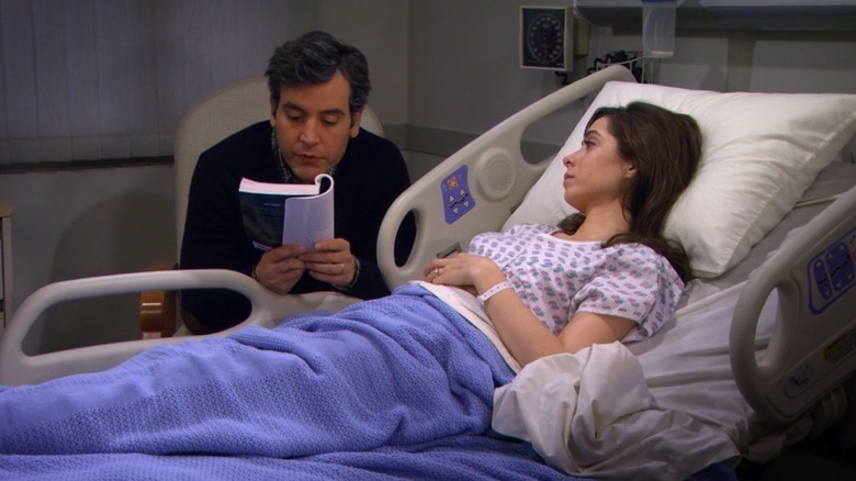 Ted reads to Tracy in hospital bed 