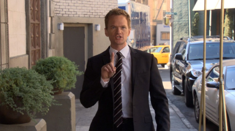 Barney Stinson choosing the suit over the girl