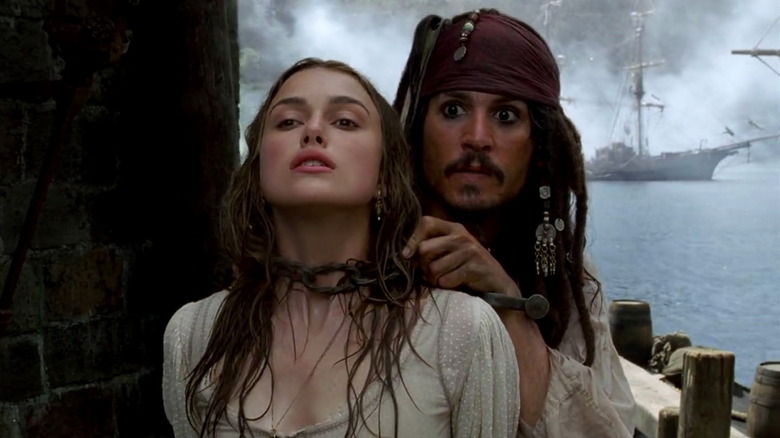 Jack Sparrow holding Elizabeth hostage