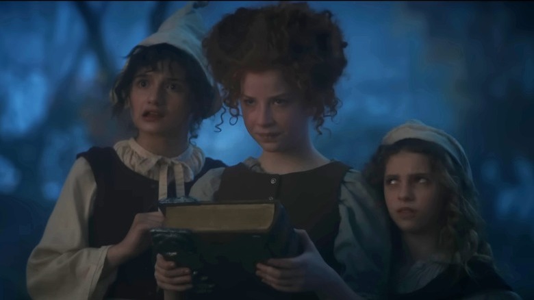 The Sanderson Sisters in a flashback scene