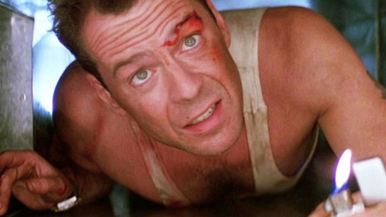 Jonh McClane crawling through ventilation shaft 