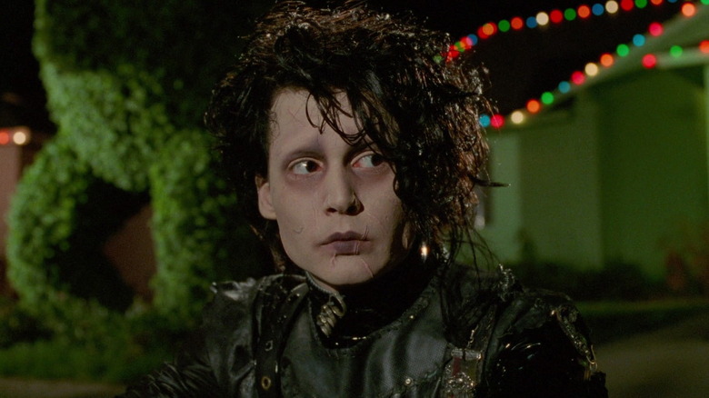 Edward Scissorhands sitting outside