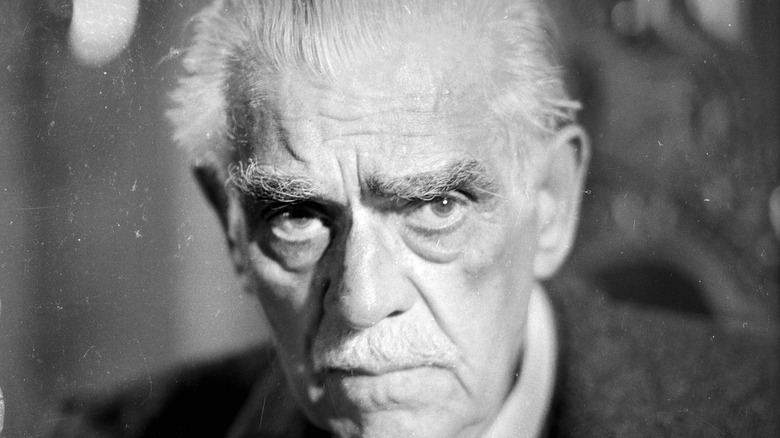 Boris Karloff stares to the side