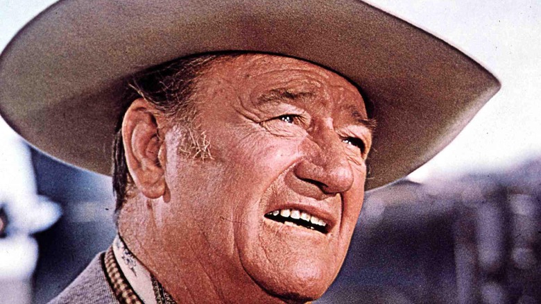 John Wayne looks into the sun