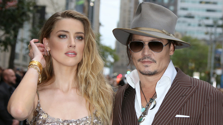 Amber Heard and Johnny Depp posing for photo