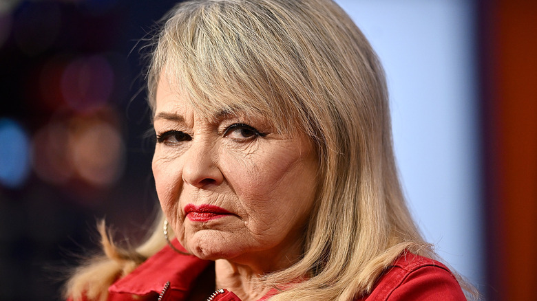 Roseanne Barr looking to the side