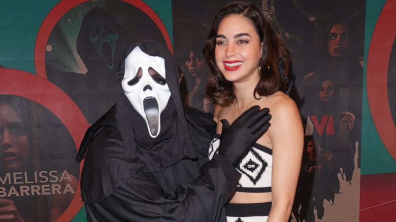 Ghostface and Melissa Barrera smiling