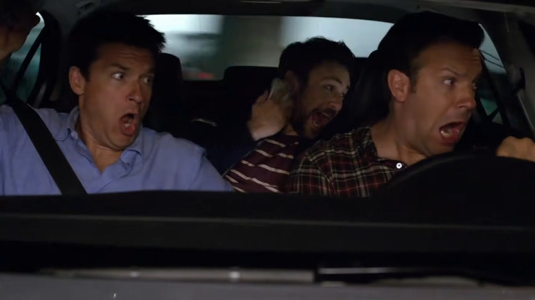 Jason Bateman, Charlie Day, and Jason Sudeikis screaming in car chase