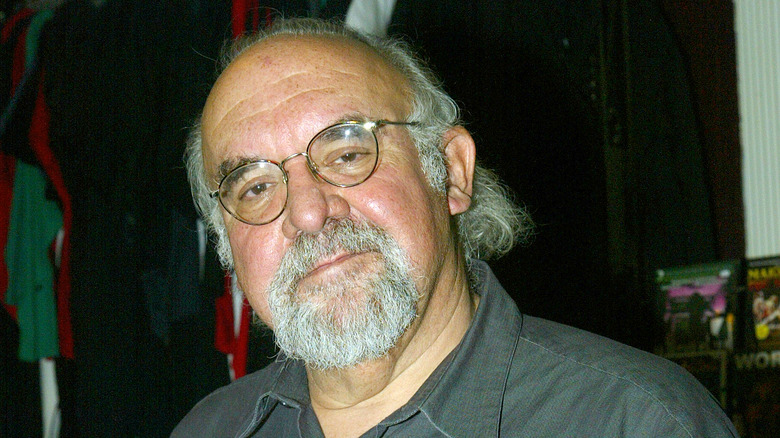 Stuart Gordon tilts head toward camera