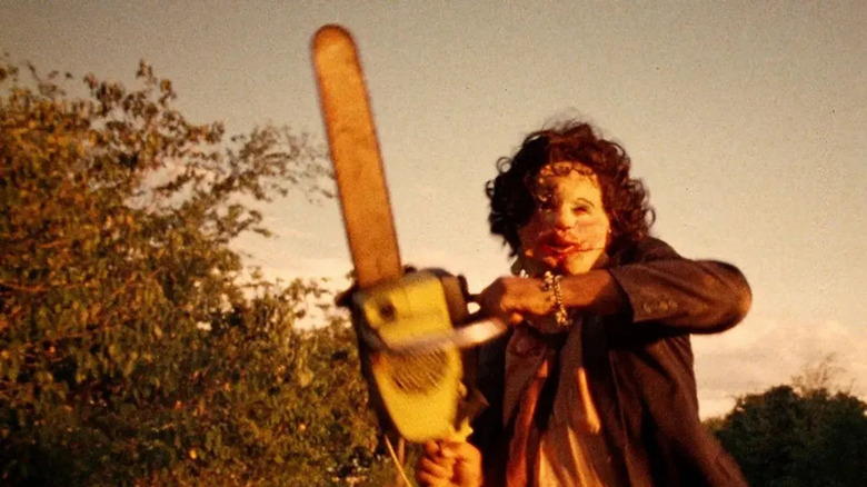 Leatherface chases down Sally 