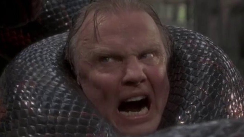 A snake crushes Jon Voight