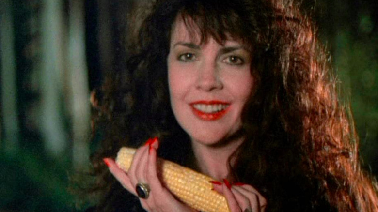 Deborah Reed holds a corncob