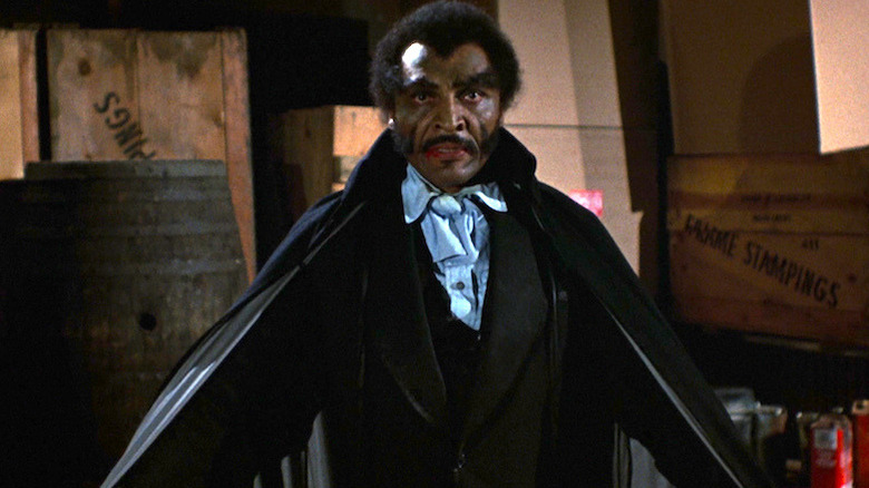 Mamuwalde/Blacula opens his cape in "Blacula" (1972)