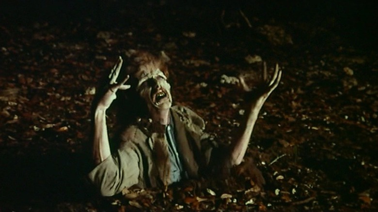 A zombie emerges from its grave in "Children Shouldn't Play with Dead Things" (1972)