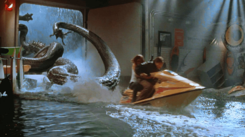 Speedboat passengers flee tentacle monster in "Deep Rising" (1998)