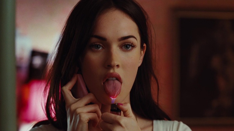 Jennifer lights a flame on her tongue in "Jennifer's Body" (2009)