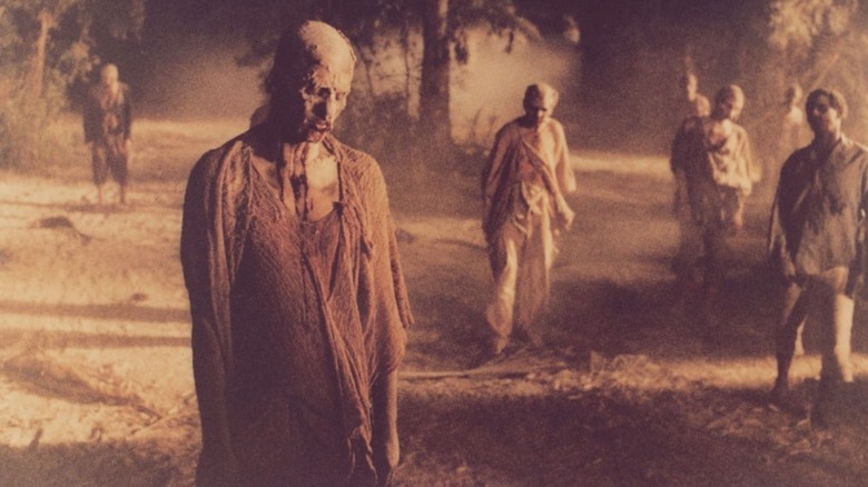 Zombies walk in "Zombie" (1979)