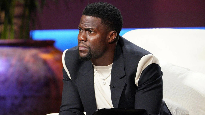 Kevin Hart leans forward