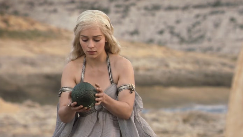 Daenerys holding dragon egg