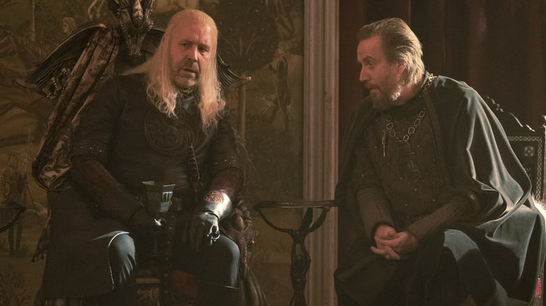 Paddy Considine as King Viserys listening to Otto Hightower Rhys Ifans