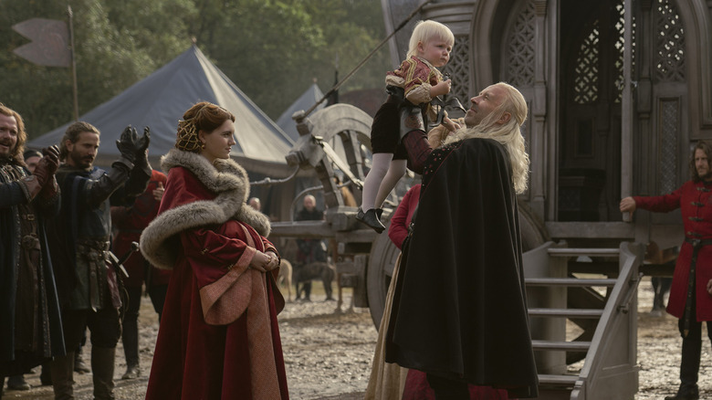 Viserys holds baby Aegon II