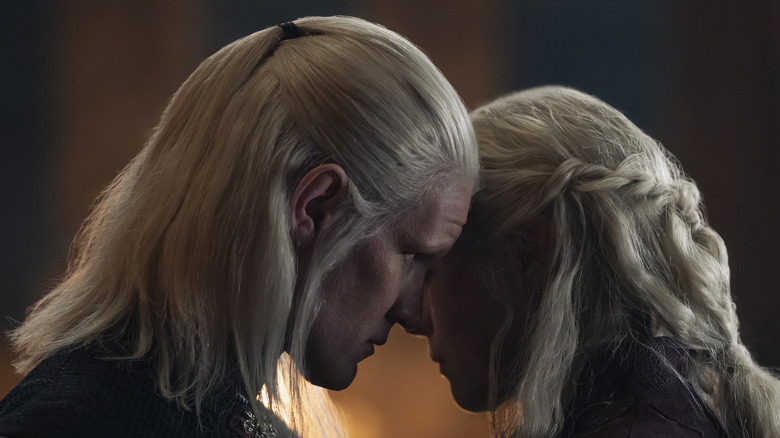 Daemon and Rhaenyra embracing