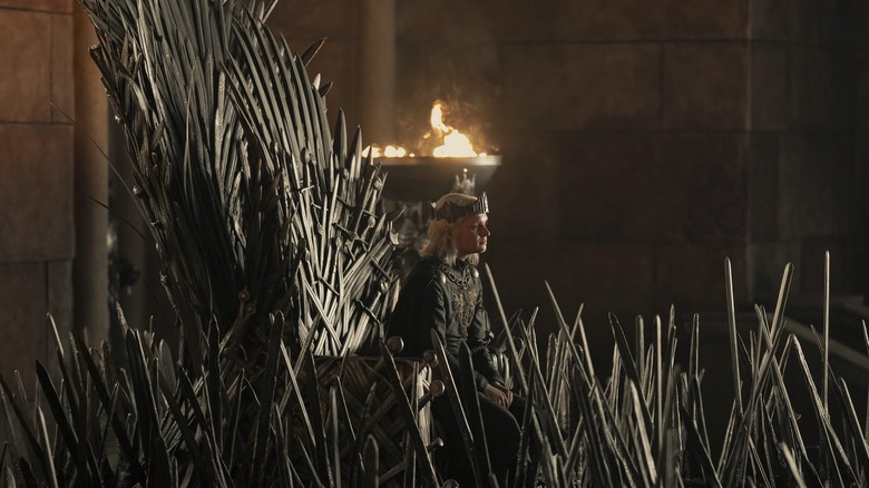 Aegon II sitting the Iron Throne