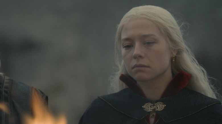 Rhaenyra Targaryen watches as her baby is burned