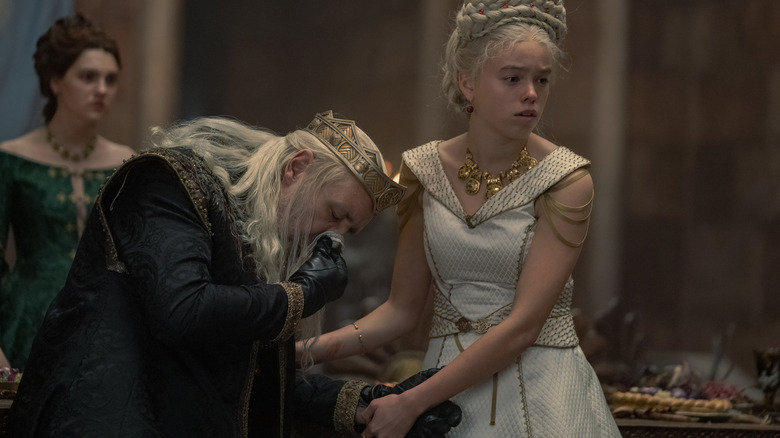 Rhaenyra helps Viserys to his seat