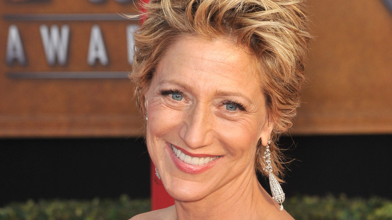 Edie Falco grins