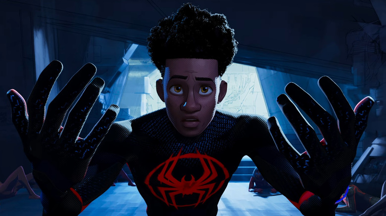 Miles Morales holding up hands