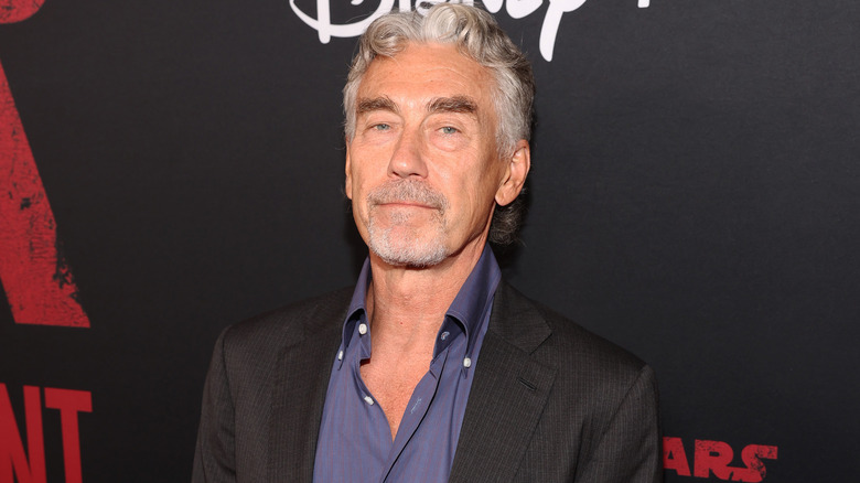 Tony Gilroy smiling at an event