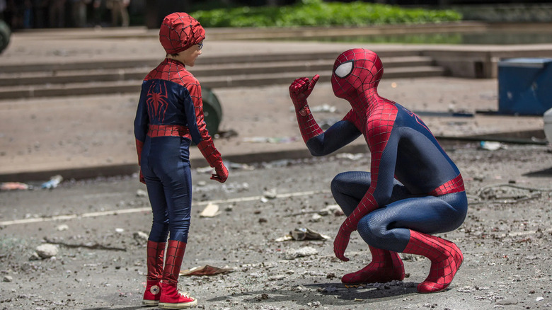 Spider-Man and young boy in costume