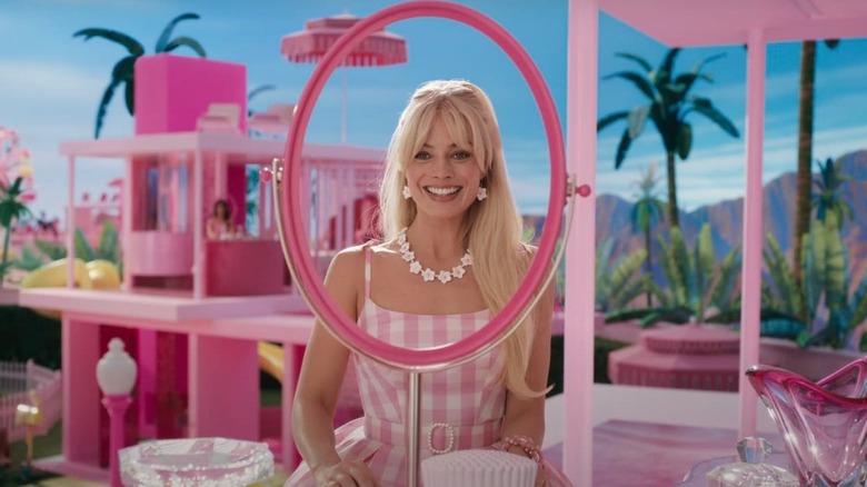 Barbie looks in the mirror