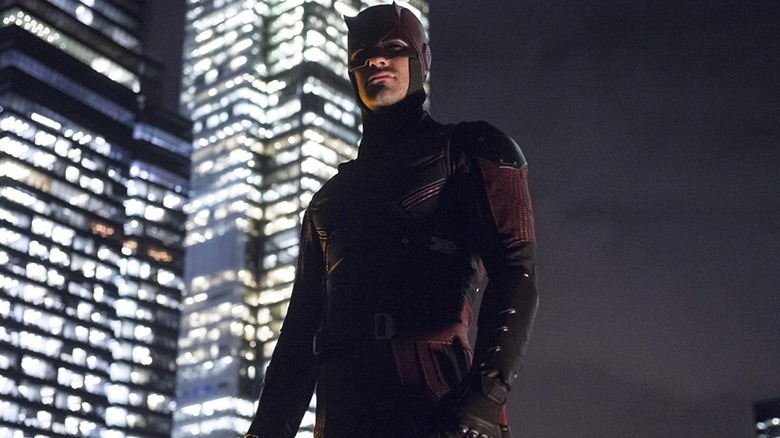 Daredevil standing on a rooftop