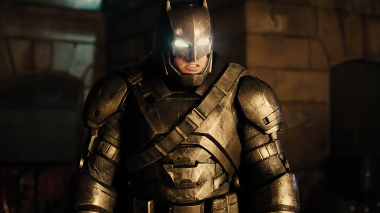 Affleck grimacing in Batman suit