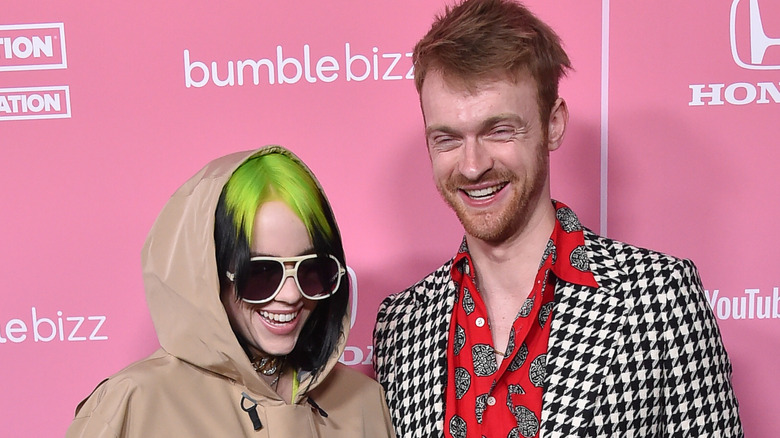 Billie Eilish and Finneas laughing