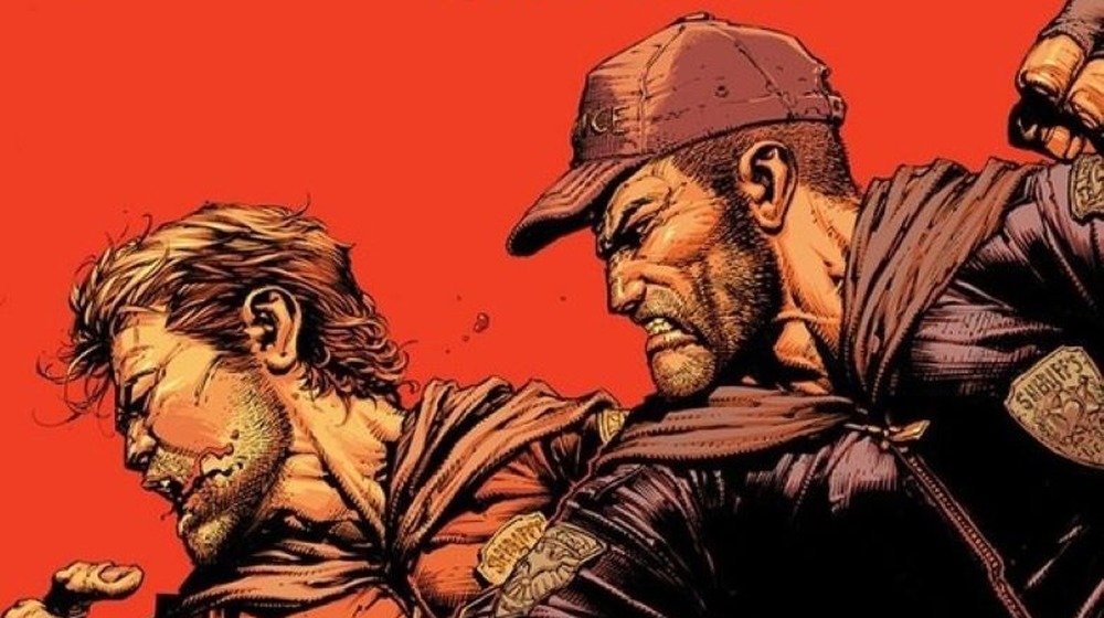 Shane Walsh punches Rick Grimes