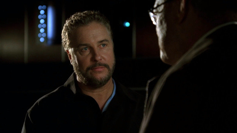 Gil Grissom smiling at Raymond Langston