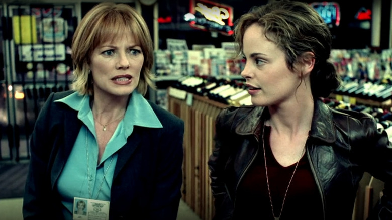 A shop keep asks Catherine Willows who will clean up the mess