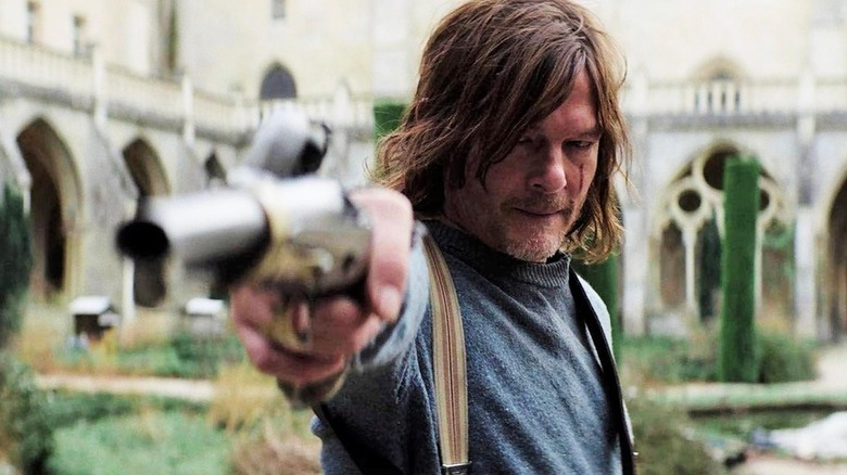 Daryl Dixon with antique pistol